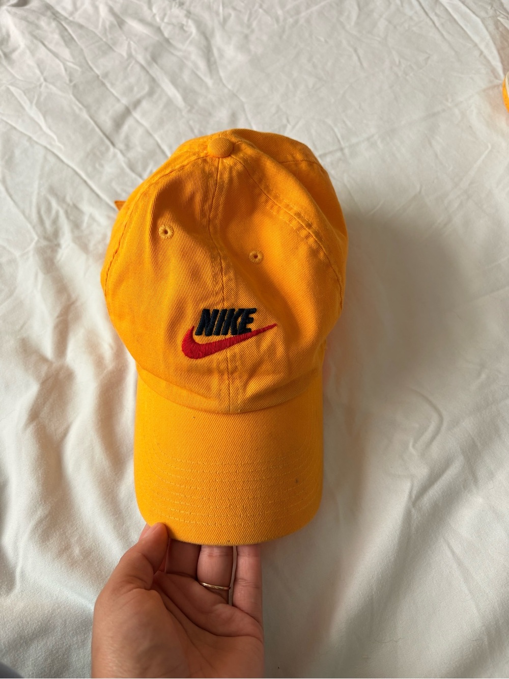 Nike Orange Hat with Black Logo and Red Swoosh